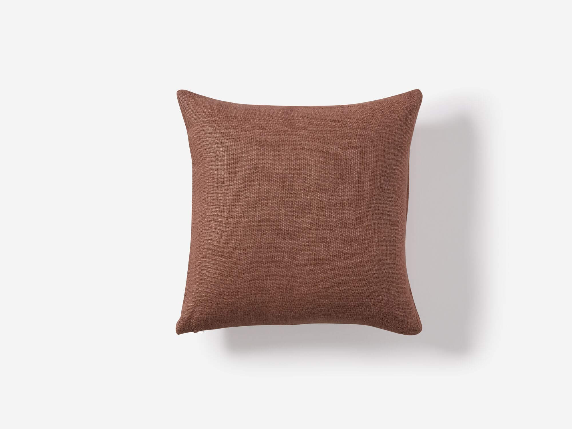 Top view of rose linen throw pillow